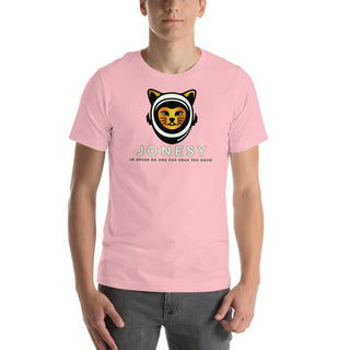 a man wearing a pink t - shirt with a cat on it