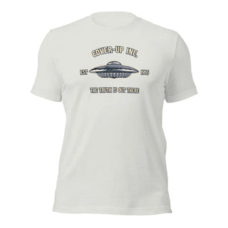 a white t - shirt with an image of a flying saucer