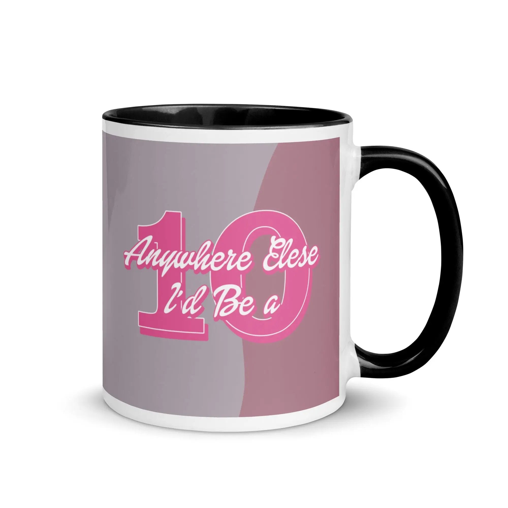 a black and white coffee mug with pink lettering