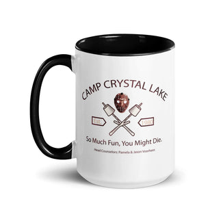 a black and white coffee mug with a camp crystal lane logo