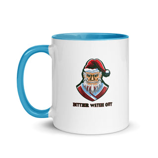 a blue and white coffee mug with a santa clause on it