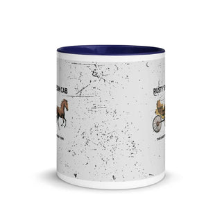a white and blue coffee mug with a picture of a horse