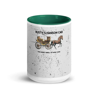 a green and white coffee mug with a horse drawn carriage