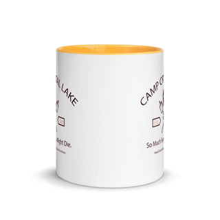 a white coffee mug with a yellow rim