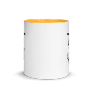 a white coffee mug with a yellow rim