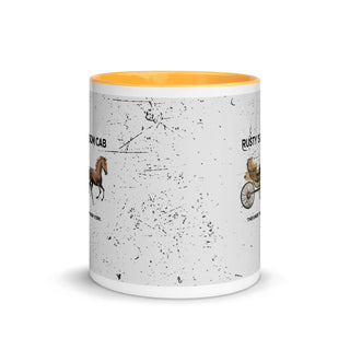 a white and yellow coffee mug with a picture of a horse