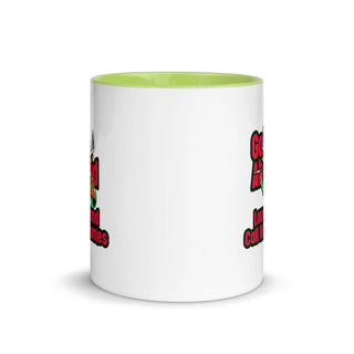 a white and green coffee mug with a green bottom