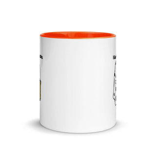 a white and orange coffee mug with words on it