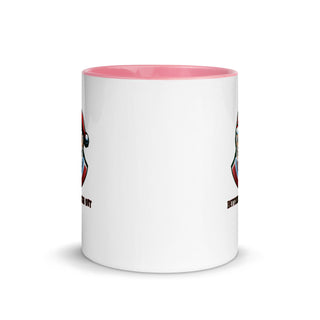 a white coffee mug with a pink rim
