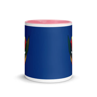 a blue mug with a colorful bird on it