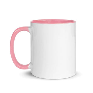 a white and pink coffee mug with a pink rim