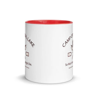 a white and red coffee mug with a red rim