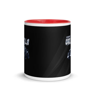 a black and white mug with a red rim