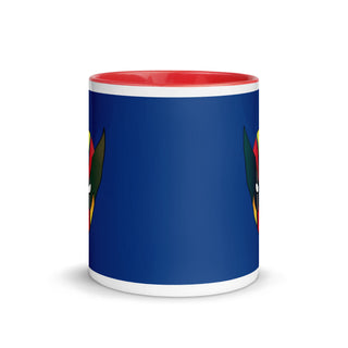 a blue and red coffee mug with a bird on it