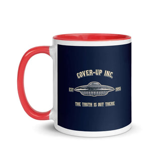 a red and white coffee mug with the words cover - up inc on it