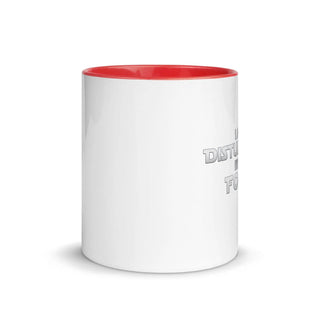 a white and red coffee mug with a red rim