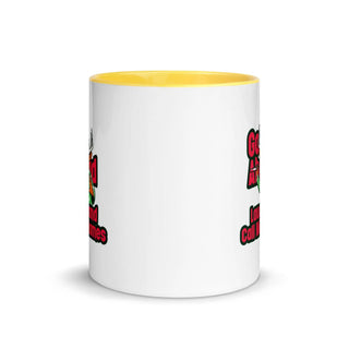 a white and yellow coffee mug with a yellow rim