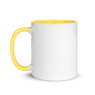 a white and yellow coffee mug with a yellow rim