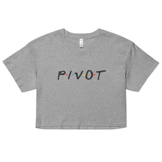 a grey crop top with the word pivot printed on it