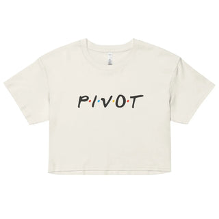 a white crop top with the word pivot printed on it