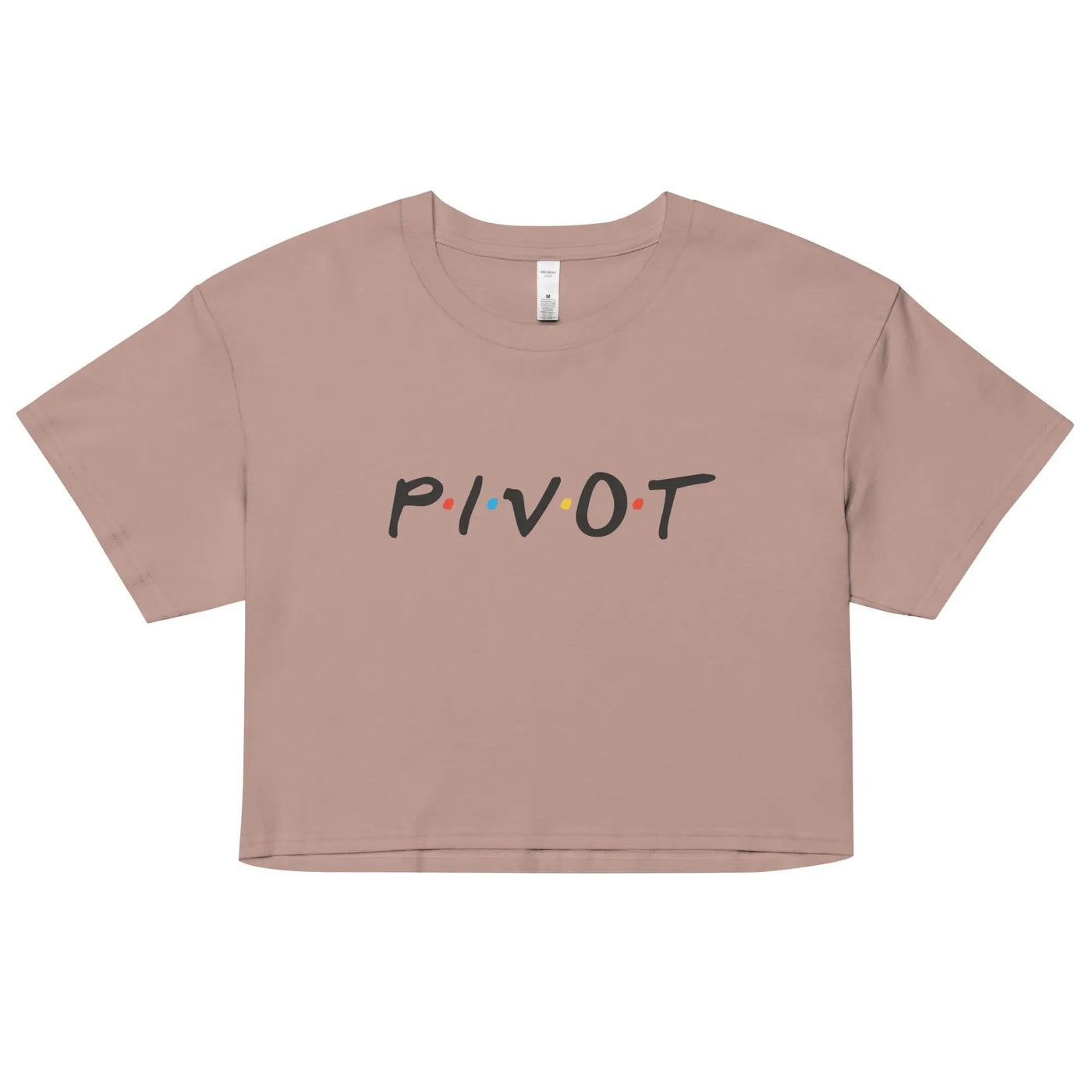 a pink crop top with the word pivot printed on it
