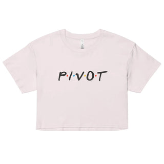 a white crop top with the word pivot printed on it