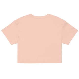 a pink t - shirt with short sleeves