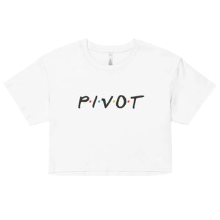 a white crop top with the word pivot printed on it