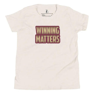 a white t - shirt with the words winning matters printed on it